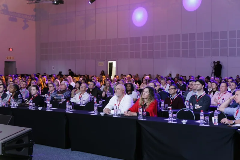 Delegates following a live presentation