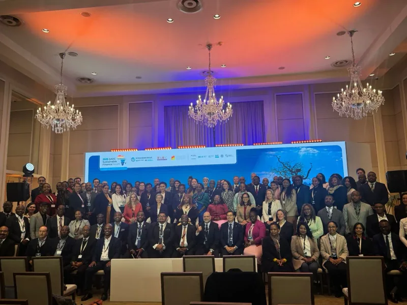 Delegates gathering for a conference group photograph